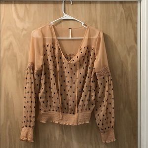 Free People. See through polkadot blouse.